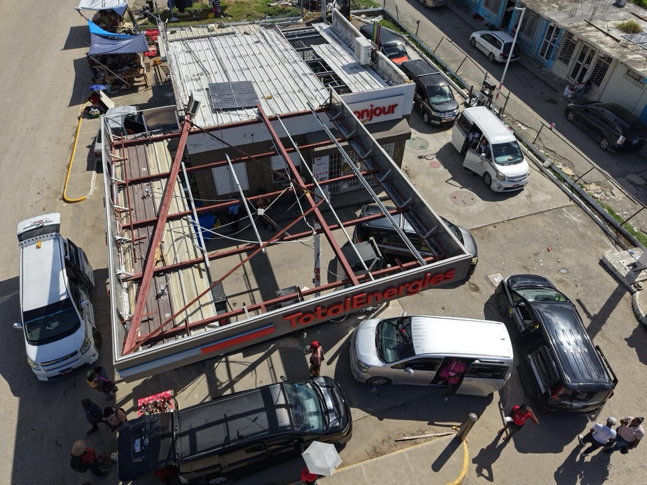 Hurricane Damage Assessments — gas station canopy, black river